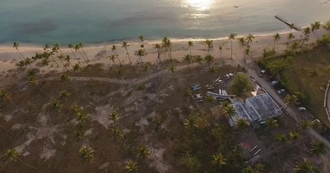 Aerial view facing ocean and moving away from the coast Stock Footage 90536095