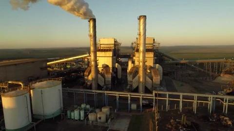 Aerial view of a factory between two chimneys Stock Footage 73703343