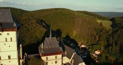 Aerial view of the famous Gothic Karlstejn Castle on top of hill, Czech Republic Stock-Footage 154881153