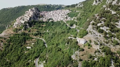 Aerial view from far of Cervara an Ancient medieval village perched on rock spur Stock Footage 92465451