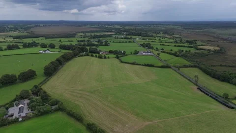 An aerial view of a farm and fields Stock Footage 328522985