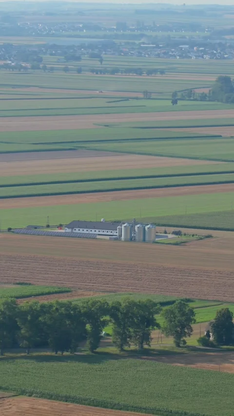 Aerial view of farm and fields in rural countryside Vidéo 348150871