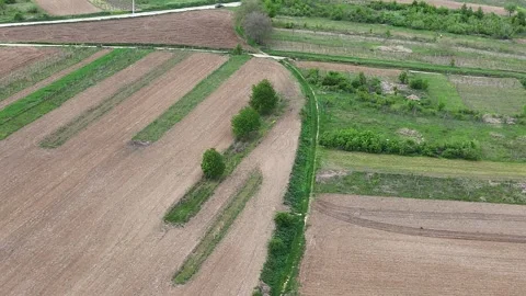Aerial view of farm fields, rural area, spring time Stock Footage 308096600