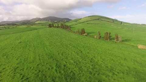 Aerial view of farm fields in the Sao Miguel Island in Azores, Portugal wide Stock Footage 75303100