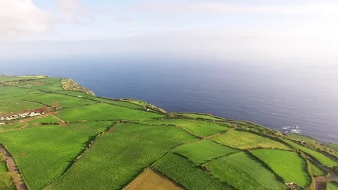 Aerial view of farm fields in the Sao Miguel Island in Azores, Portugal wide Stock Footage 75331806