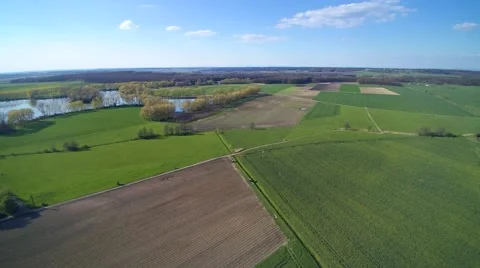 Aerial view of farm fields in spring Stock Footage 62918685