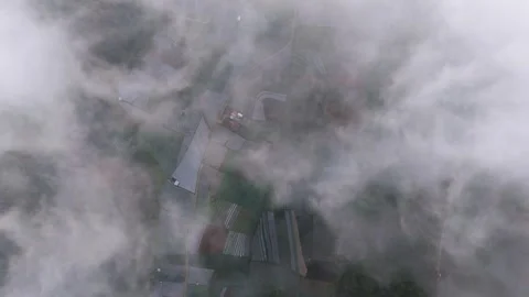 Aerial view of farm fields through clouds, Nepal van Java, Indonesia. Video stock 331860568
