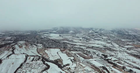 Aerial view of farm fields in winter. Stock Footage 151975653