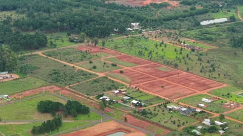 Aerial view of farmland development and residential subdivision near the Stock Footage 309080214