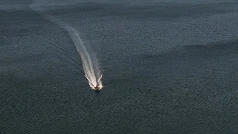 Aerial view of fast approaching speedboat Stock Footage 245397459