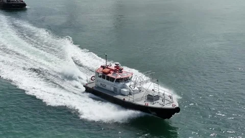 Aerial view of a fast boat speeding through the water Stock Footage 294067136
