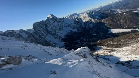 Aerial View Fast Flight Over Icy Alpine Ridge, 4K Stock Footage 321152610