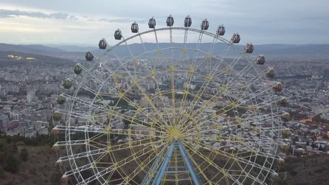 Aerial view of Ferris wheel in Mtatsminda Park. Tbilisi TV Tower. Georgia 2017 a Stock Footage 83558429