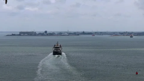 Aerial view of a ferry crossing between a Dutch island and the mainland Stock Footage 339771956