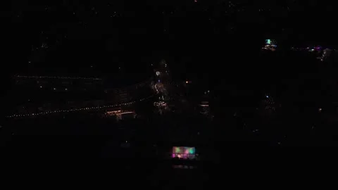 Aerial view of festive Koedijk during gondola parade at night Stock Footage 343839929