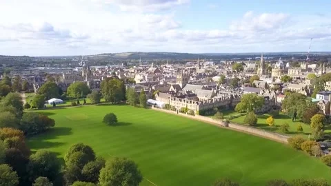 Aerial view of a Field & cathedral campus Drone Footage, HD, 25F Stock Footage