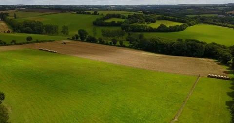Aerial view of field with tractor Stock Footage 87777645