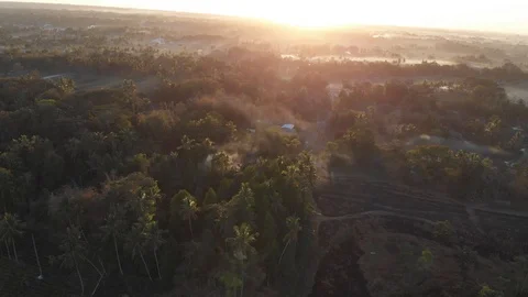 aerial view of fields and beautiful mountain while sunrise Stock Footage 107702185