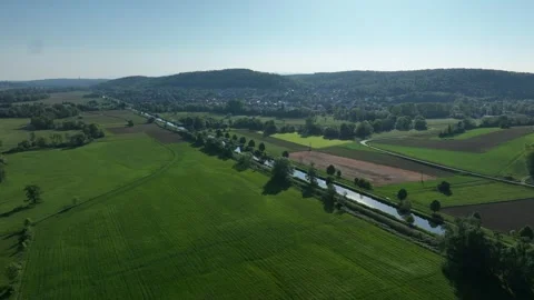 Aerial view of fields and a canal, France. Stock Footage 321472816