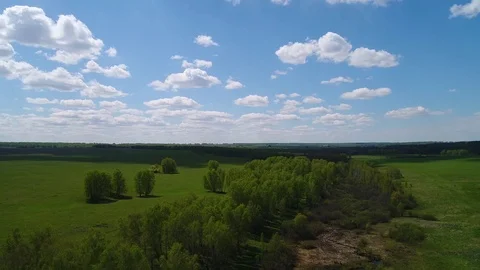 Aerial view of fields and forest clouds river Siberian landscape Stock Footage 75811256