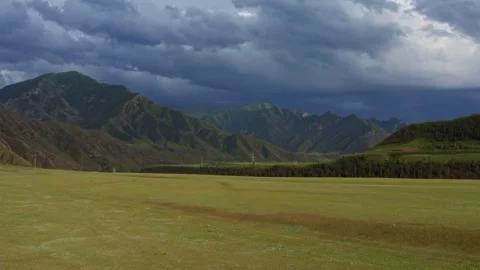 Aerial view of fields and mountains Stock Footage 317714442