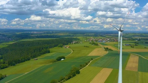 Aerial view of fields and wind turbine Stock Footage 124995670