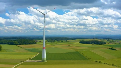 Aerial view of fields and wind turbine Stock Footage 125023241