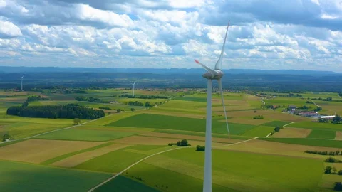 Aerial view of fields and wind turbine Stock Footage 125024748