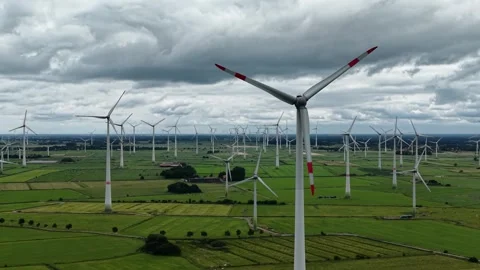 Aerial view of fields and a wind turbine farm Vidéo 340906556