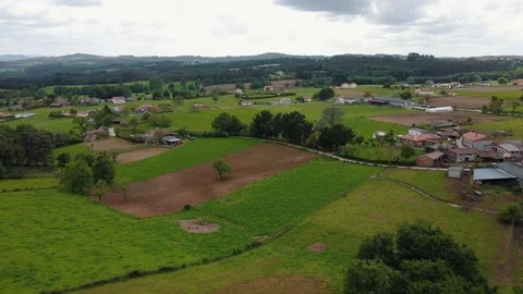 Aerial view of fields and woods in asturias 스톡 동영상 195462059