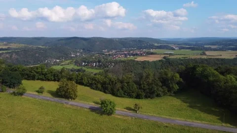 Aerial view of fields, forest, river, village, hills in summer. Czech Republic. Stock Footage 161173141