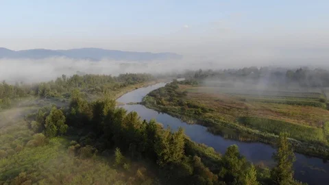 Aerial View Of Fields, River And Distant Mountains In Ukraine Stock Footage 94159317