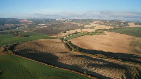 Aerial view of the fields, wineries near San Quirico d'Orcia. Tuscany autumn Stock Footage 122003997