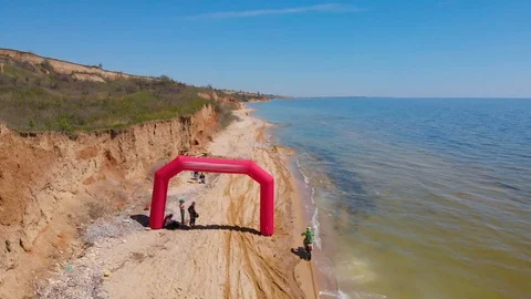Aerial view of the final stage of the Enduro extreme race on the seashore in 4K. Stock Footage 90055062