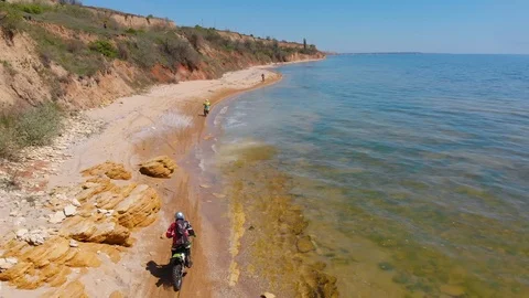 Aerial view of the final stage of the Enduro extreme race on the seashore in 4K. Stock Footage 90056738