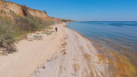 Aerial view of the final stage of the Enduro extreme race on the seashore in 4K. Stock Footage 90061285