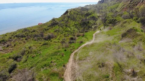 Aerial view of the final stage of the Enduro extreme race on the seashore in 4K. Stock Footage 90062864