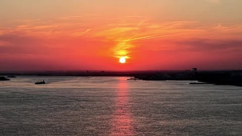 Aerial View of a Fire Sky Sunset over Delaware River Stock Footage 304565924