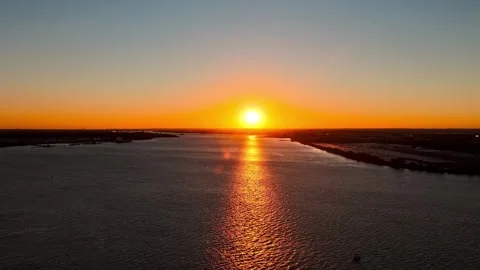 Aerial View of a Fire Sky Sunset over Delaware River Stock Footage 318339687
