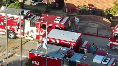 Aerial View of Fire Trucks Staging on a Street in Los Angeles Stock Footage 327472465