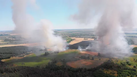 Aerial View of Fire in Wheat Field. Flying over Smoke above Agricultural Fields Stock Footage 135358976