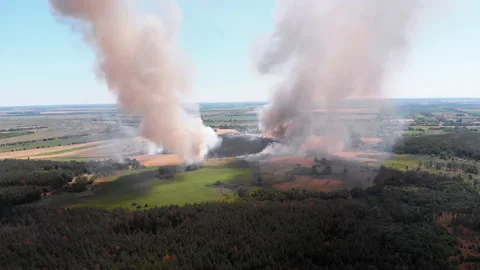 Aerial View of Fire in Wheat Field. Flying over Smoke above Agricultural Fields Stock Footage 135410693