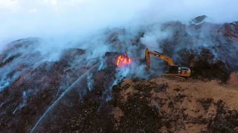 Aerial view of the firemen using a Digge... | Stock Video | Pond5