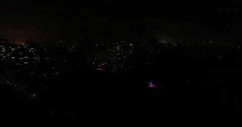 Aerial View of Fireworks Around Beach in Night Stock Footage 103498975