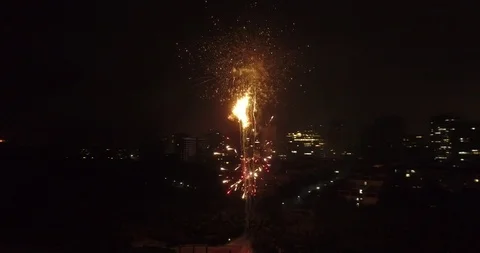 Aerial View of Fireworks Around Beach in Night Stock Footage 103499862