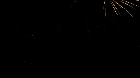 Aerial view of fireworks display over a dark black sky Stock Footage 201128606