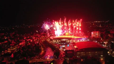 Aerial view of fireworks exploding during night show at New Year's Eve party Stock Footage 221432601