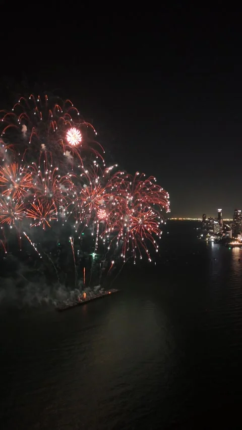 Aerial View of Fireworks Exploding Over Water in Pattaya, Thailand Stock Footage 335844159
