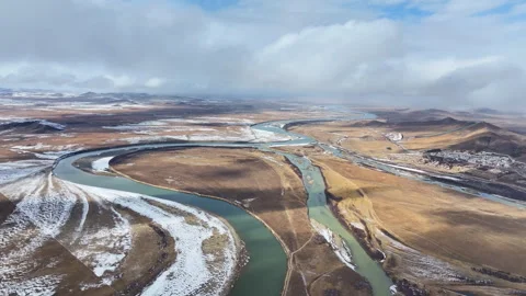 Aerial view of the First Bend of the Yellow River and Sogtsang Monastery Stock Footage 332589087
