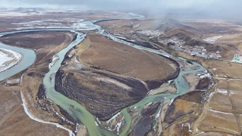 Aerial view of the First Bend of the Yellow River and Sogtsang Monastery Video stock 332589094